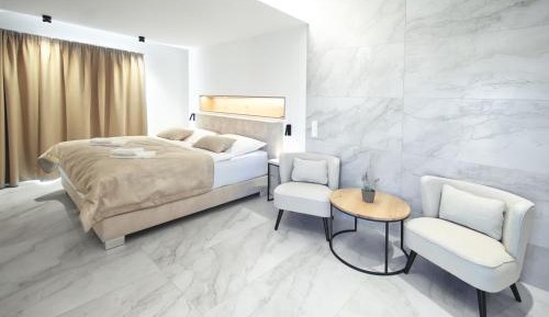 One-Bedroom Apartment with Balcony and City View