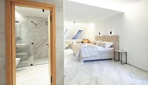 One-Bedroom Apartment with Balcony and City View