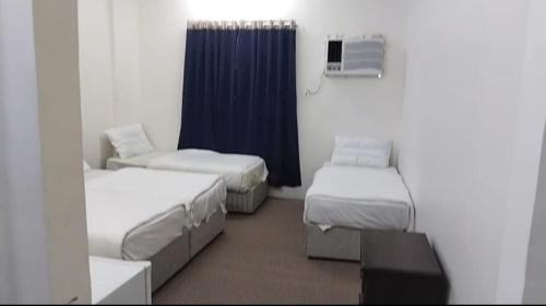 Quadruple Room with Private Bathroom