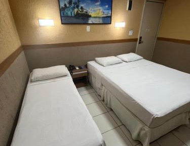 Triple Room (1 Double Bed + 1 Single Bed)