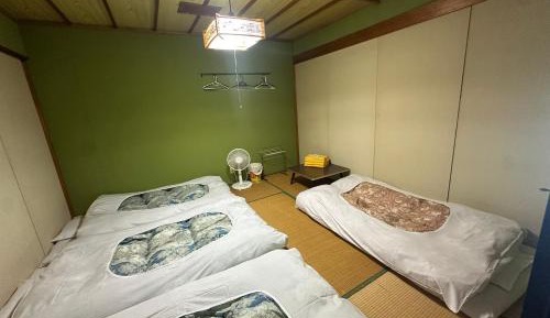Quadruple Room with Shared Bathroom