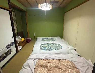 Triple Room with Shared Bathroom ( No Window ) 