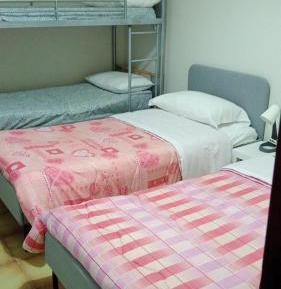 Quadruple Room with Shared Bathroom