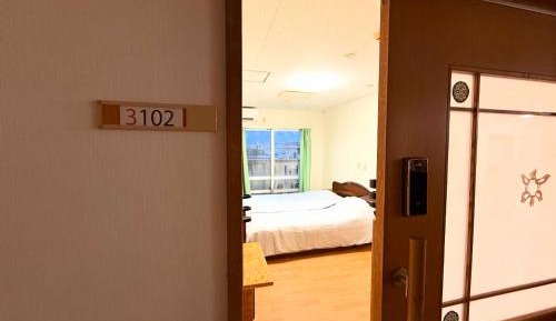 Quadruple Room with Shared Bathroom