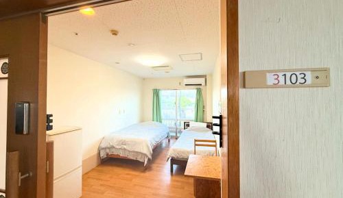 Quadruple Room with Shared Bathroom