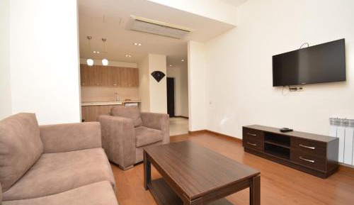 One-Bedroom Apartment with Balcony and City View