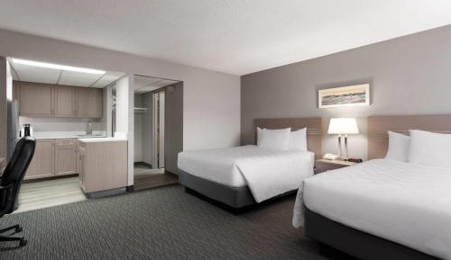 Deluxe Queen Room with Two Queen Beds and Full Kitchen - Ground Floor/Non-Smoking