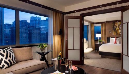 Prestige One-Bedroom Corner King Suite with Roll-In Shower and Sofa Bed - Mobility Accessible