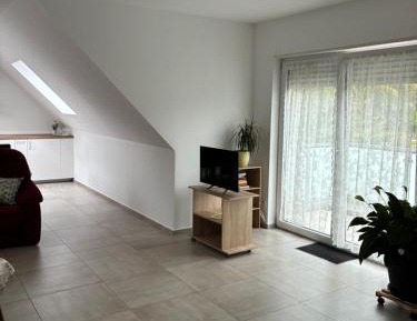 One-Bedroom Apartment with Balcony and City View