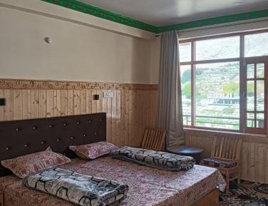 Deluxe Room (2 Adults + 1 Child)