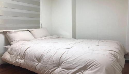 Queen Room with Shared Bathroom