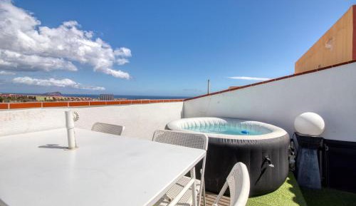 Four-Bedroom Apartment with Balcony 