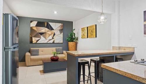 Suite con cocina y sala