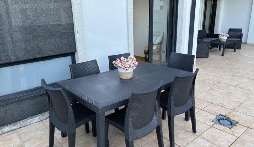 Three-Bedroom Apartment with Sea View