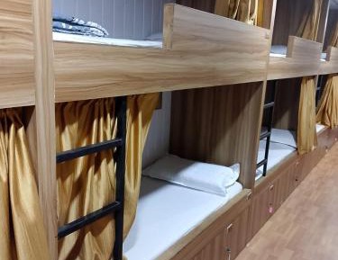Single Bed in Male Dormitory Room with Shared Bathroom