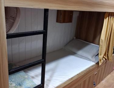 Single Bed in Male Dormitory Room with Shared Bathroom