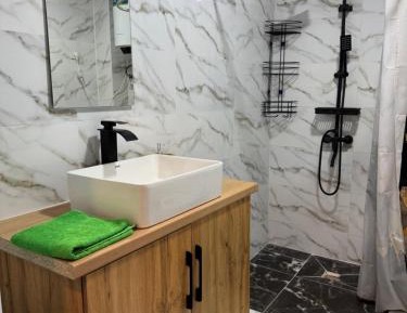 Deluxe One-Bedroom Apartment with Garden View