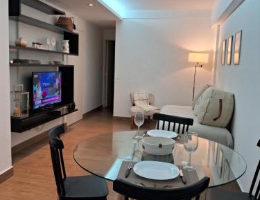 One-Bedroom Apartment with Balcony and City View
