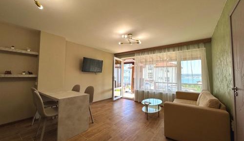 One-Bedroom Apartment with Balcony and Sea View