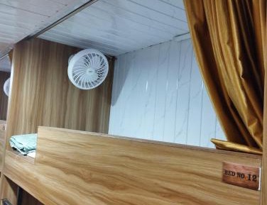 Single Bed in Male Dormitory Room with Shared Bathroom