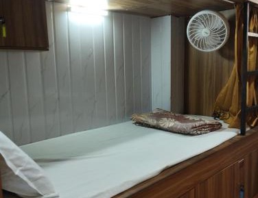 Single Bed in Male Dormitory Room with Shared Bathroom