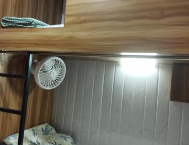 Single Bed in Male Dormitory Room with Shared Bathroom