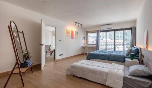 One-Bedroom Apartment with Balcony and City View