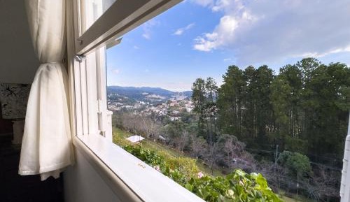 Four-Bedroom Apartment with Balcony 