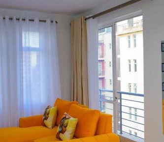 One-Bedroom Apartment with Balcony and City View