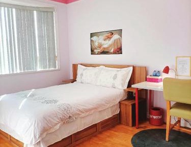 Queen Room with Shared Bathroom