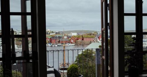 Four-Bedroom Apartment with Balcony 