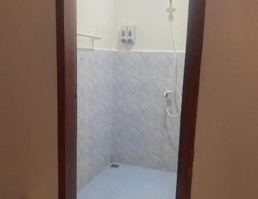 Single Bed in Dormitory Room