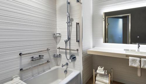 Queen Room with Two Queen Beds and Adapted Tub - Mobility and Hearing Accessible