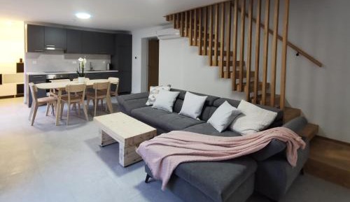 Two-Bedroom Deluxe Duplex Apartment with Balcony and Garden View
