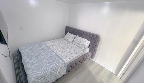 Queen Room with Shared Bathroom