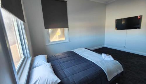 Queen Room with Shared Bathroom
