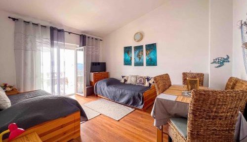 Three-Bedroom Apartment with Sea View