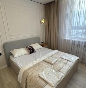 Deluxe One-Bedroom Apartment with City View