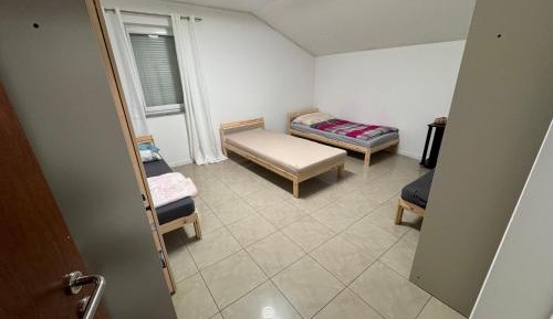 Triple Room with Shared Bathroom