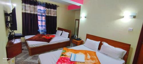 Quadruple Room with Private Bathroom