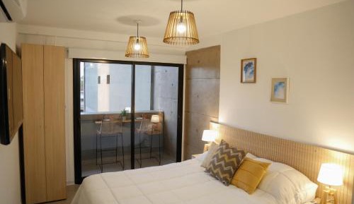 One-Bedroom Apartment with Balcony and City View