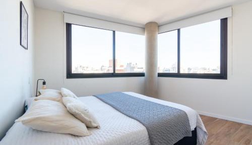 One-Bedroom Apartment with Balcony and City View