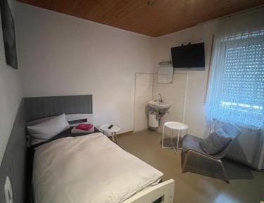 Single Room with Shared Shower and Toilet