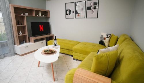 One-Bedroom Apartment with Balcony and City View