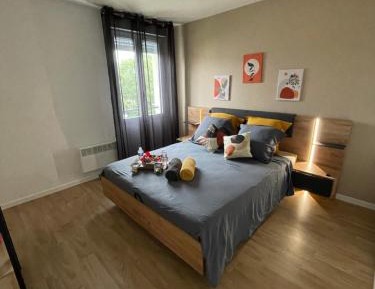 One-Bedroom Apartment with Balcony and City View