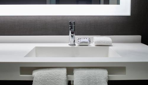 Corner Junior King Suite with Sofa Bed