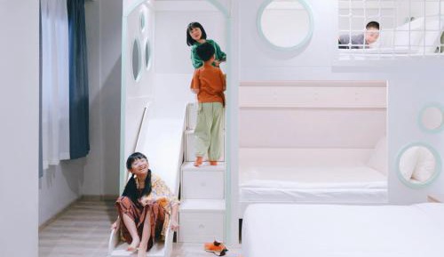 Cinematic Family Room with Slide