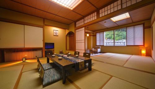 Japanese-Style Family Room with Shared Bathroom