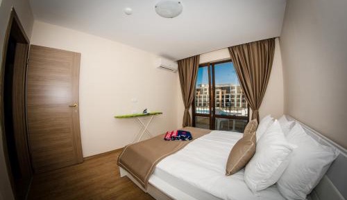 One-Bedroom Apartment with Side Sea View (2 Adults + 2 Children)