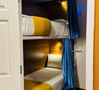 Single Bed in Dormitory Room